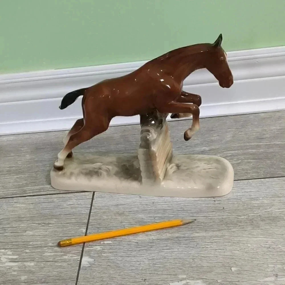 Horse jumping a  wall ceramic